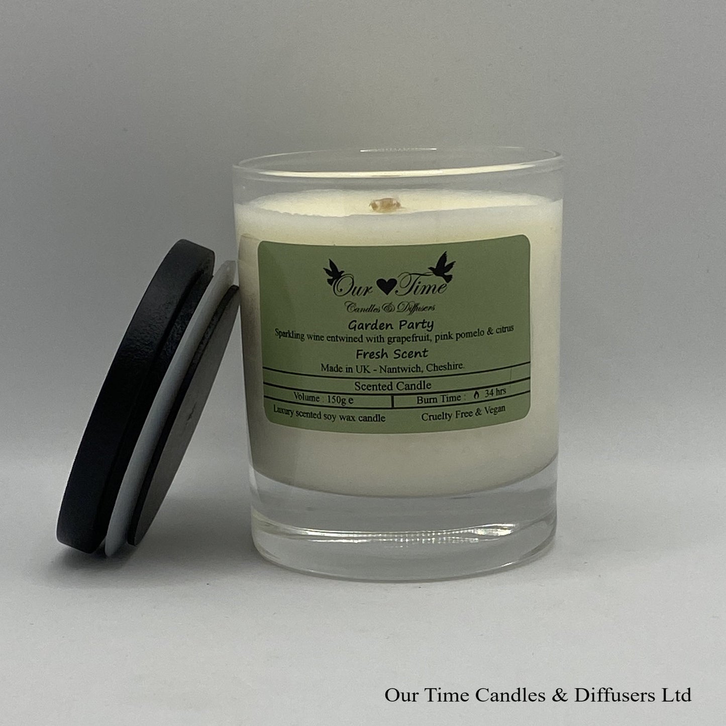 Medium Scented Candle with black lid off