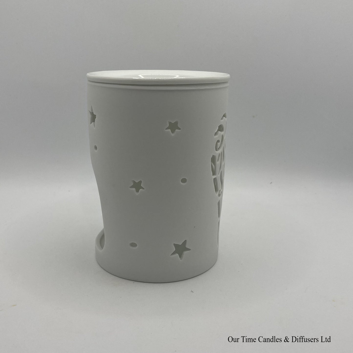 Side view of our Angel Wings cut-out wax burner in white ceramic