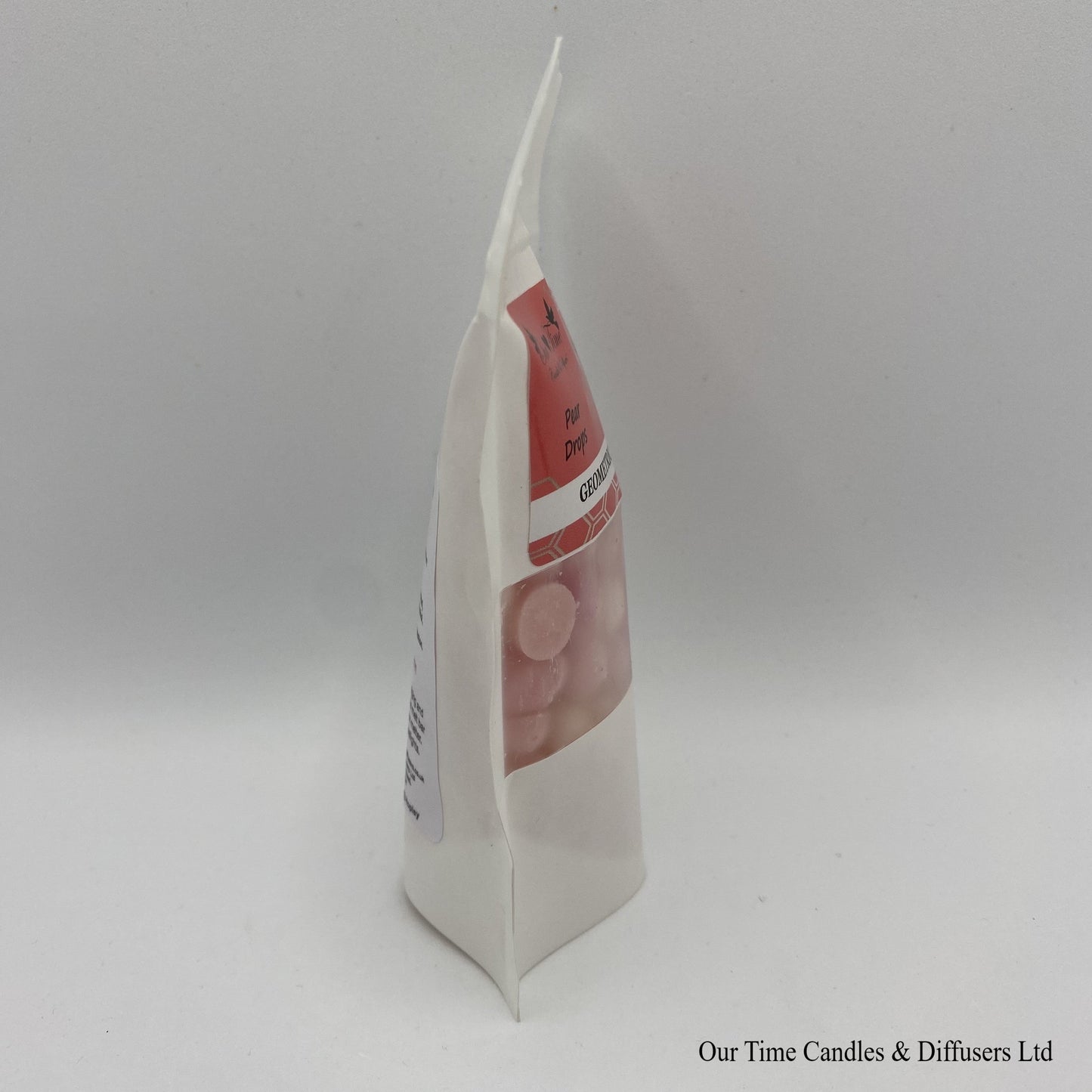 Sweet Pear Drop scented soy wax melt drops in a white bag