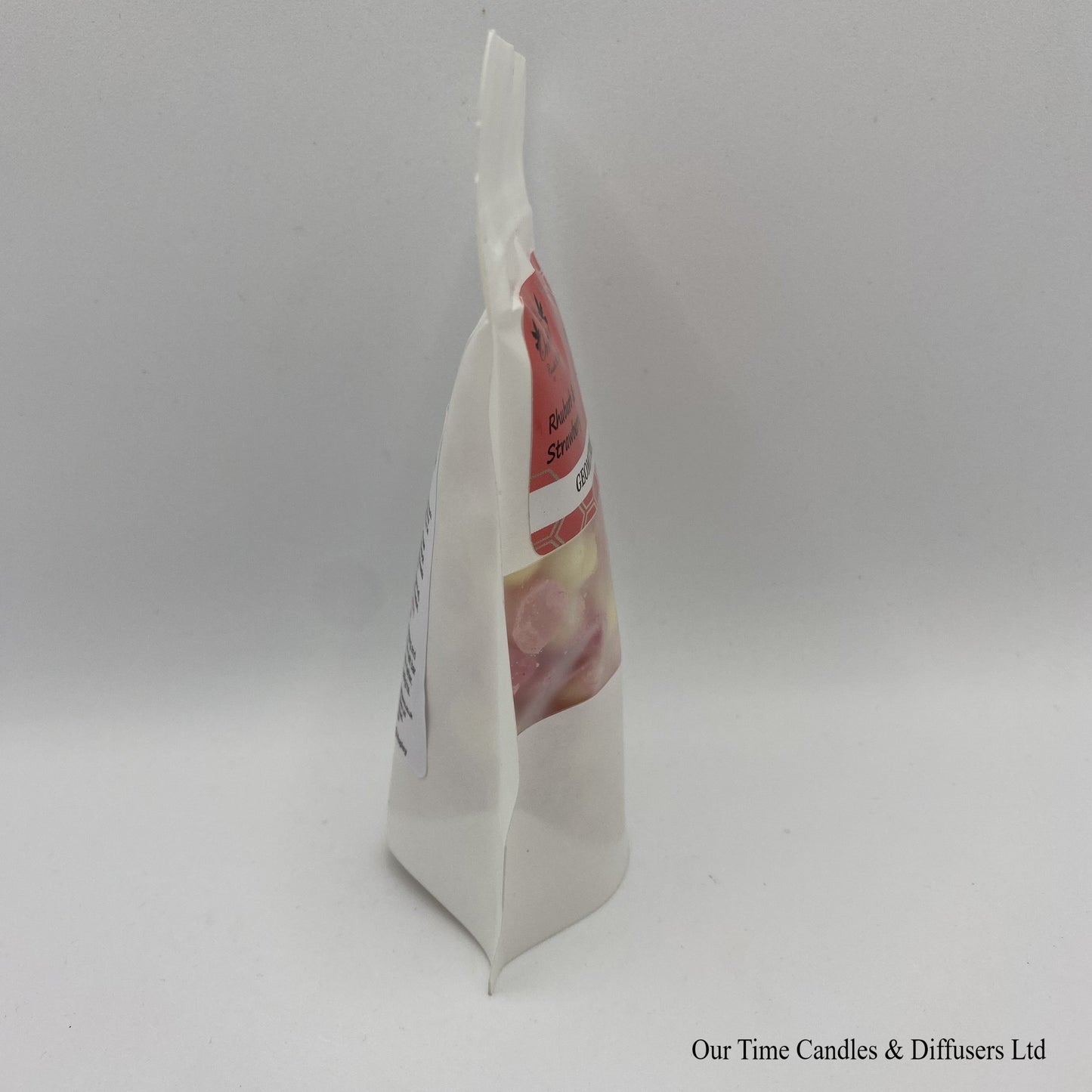 Rhubarb & Strawberry scented soy wax melt drops in a white bag