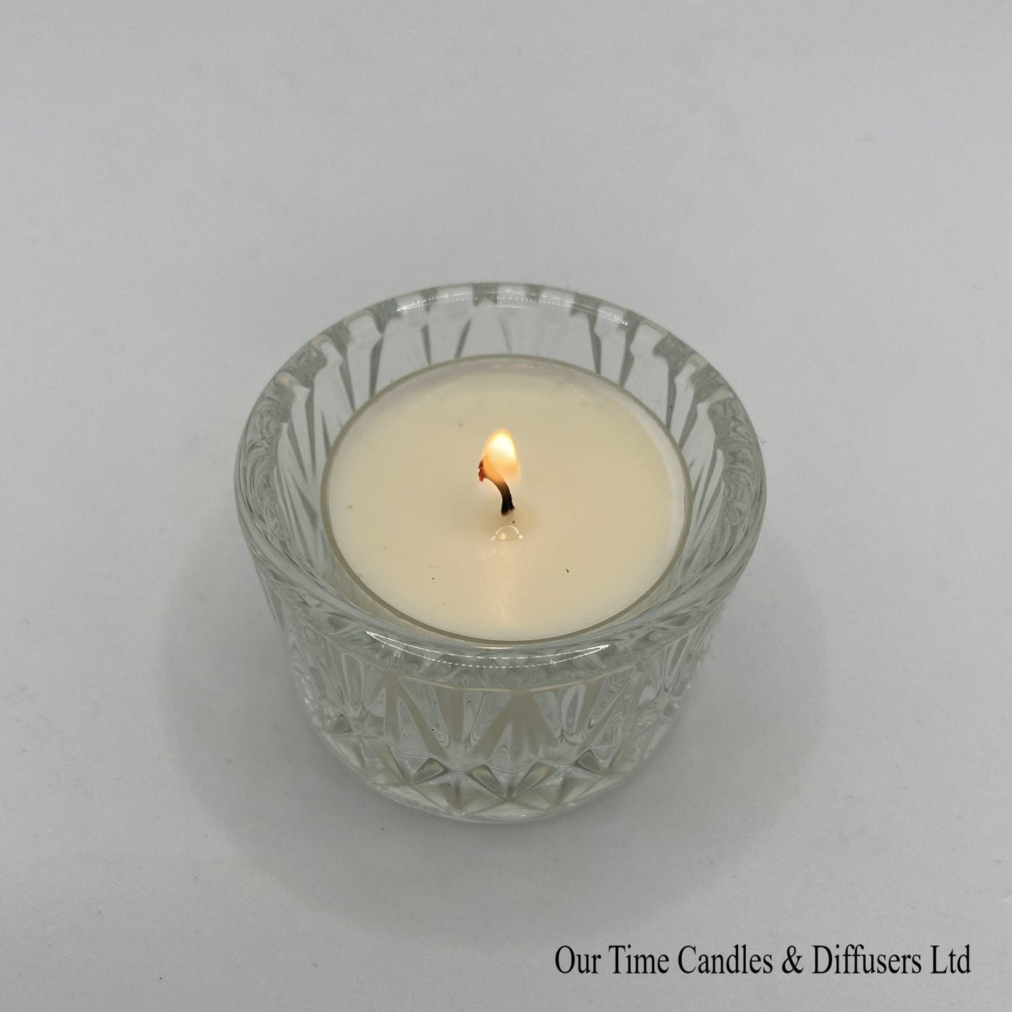 Decorative tealight holder - clear with tealight