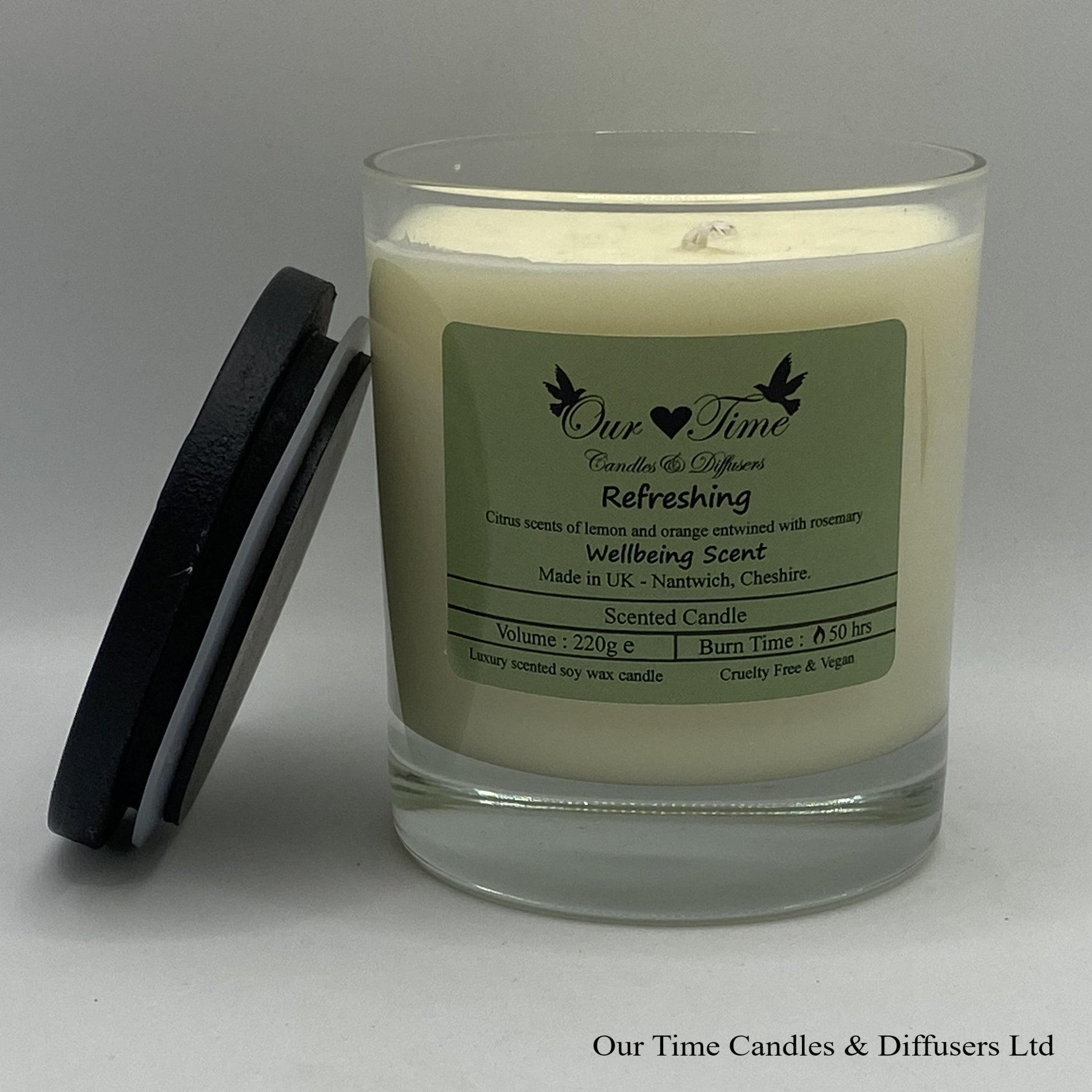 Large Candle with black lid off