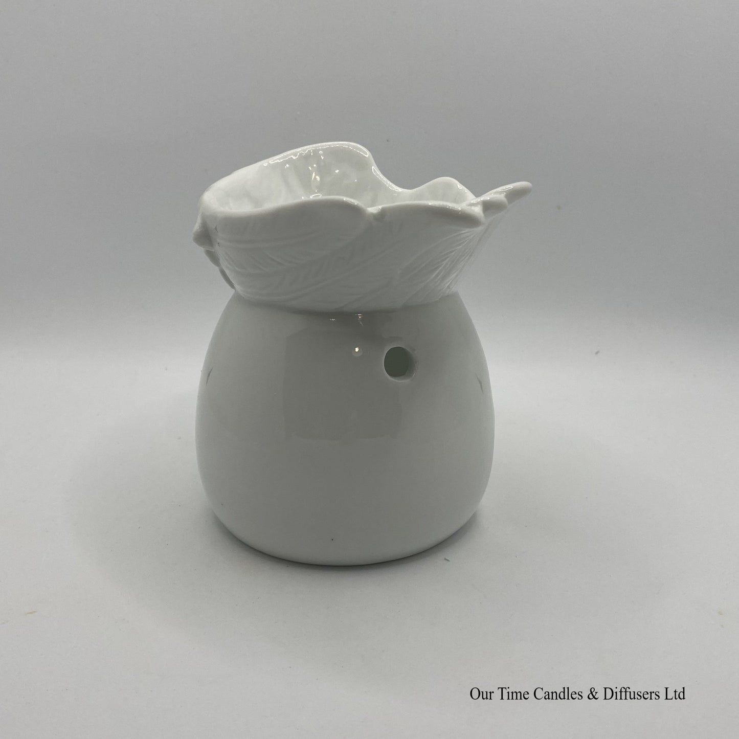 Side view of our Angel Wings Wax Burner with large melt bowl.