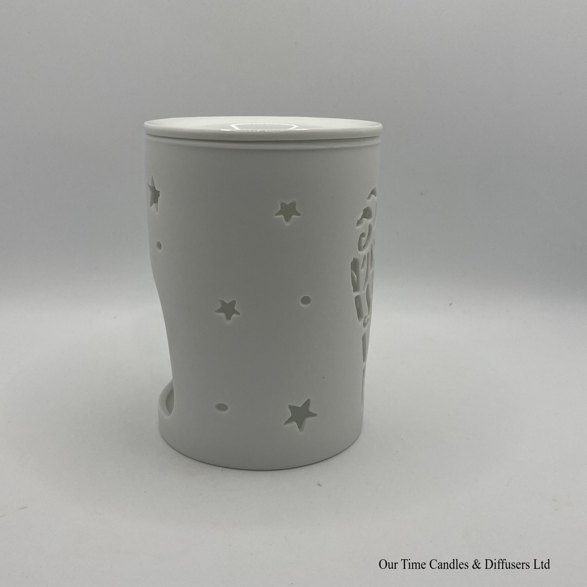 Side view of our Angel Wings cut-out wax burner in white ceramic