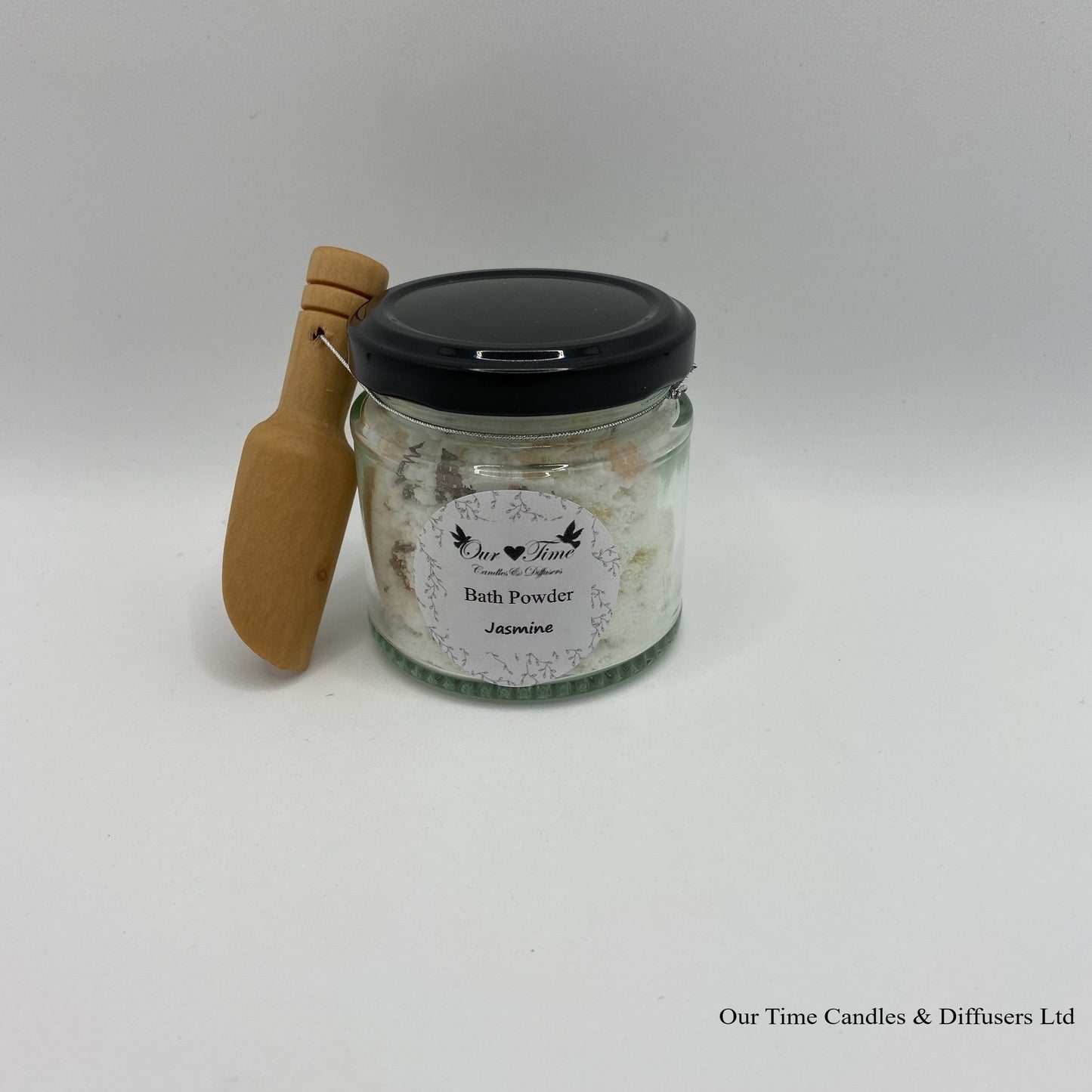 Bath Powder - Jasmine product image showing filled jar with black lid and wooden scoop