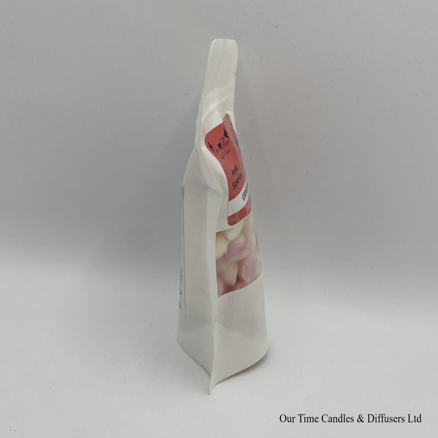 Angel Supernova inspired soy wax melt drops in a white bag