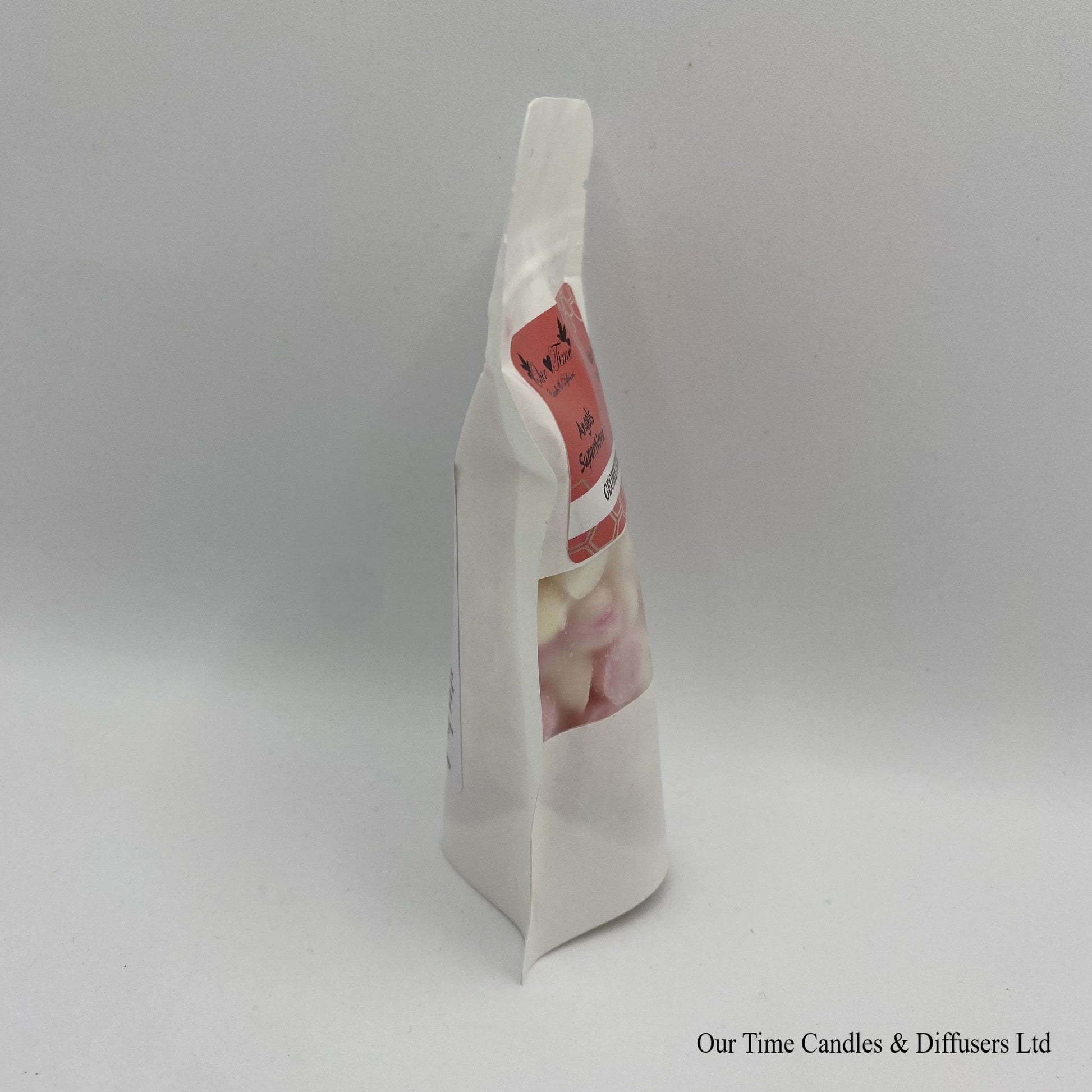 Angel Supernova inspired soy wax melt drops in a white bag