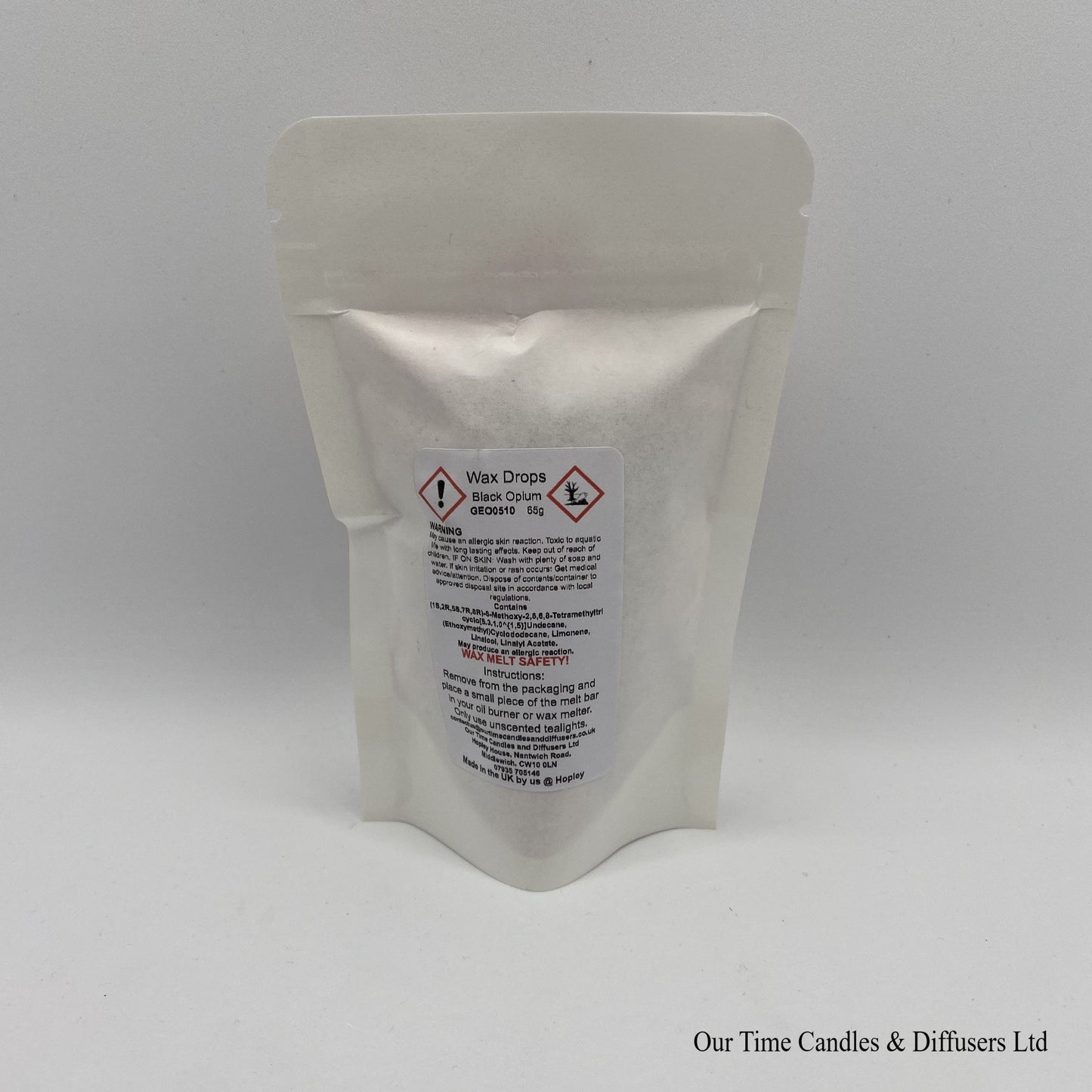 Black Opium Inspired scented soy wax melt drops in a white bag