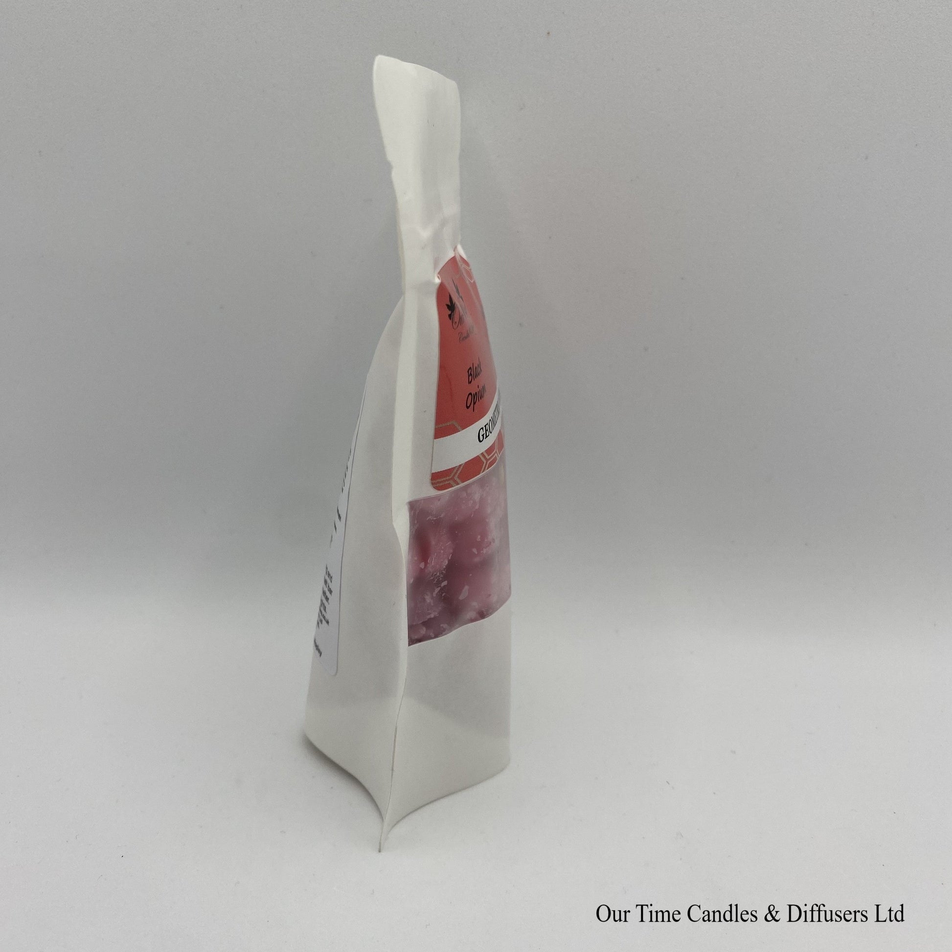 Black Opium Inspired scented soy wax melt drops in a white bag