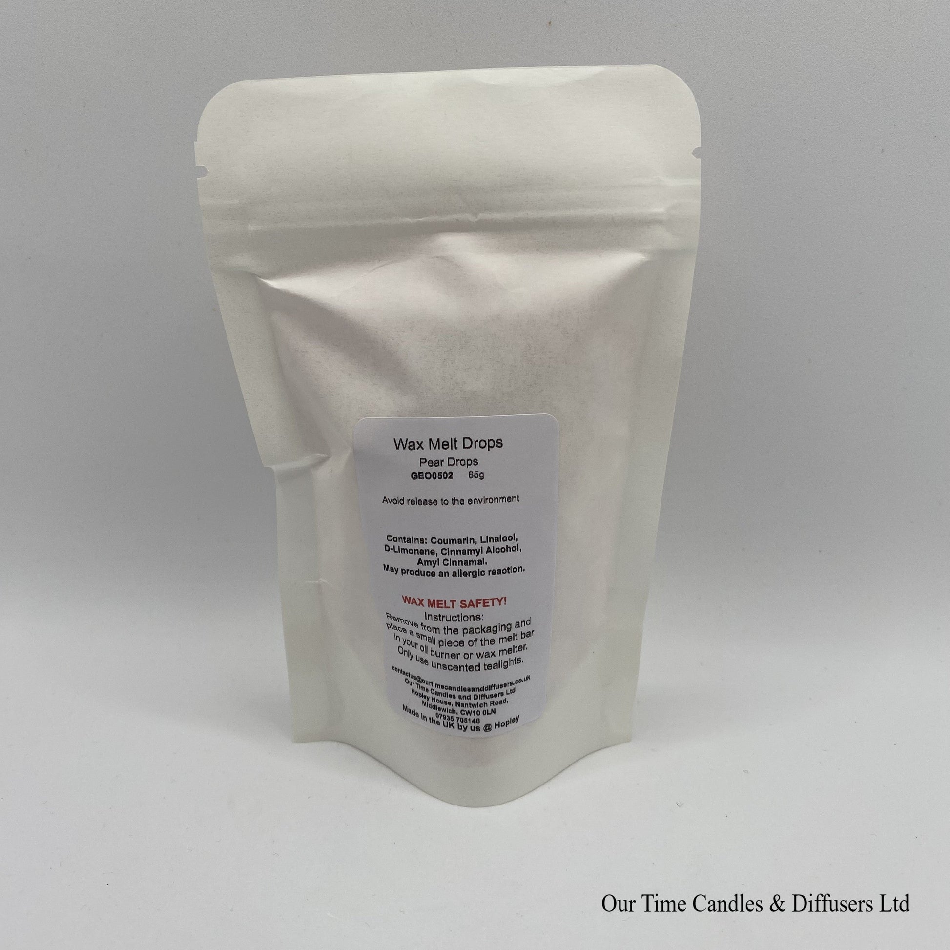 Sweet Pear Drop scented soy wax melt drops in a white bag