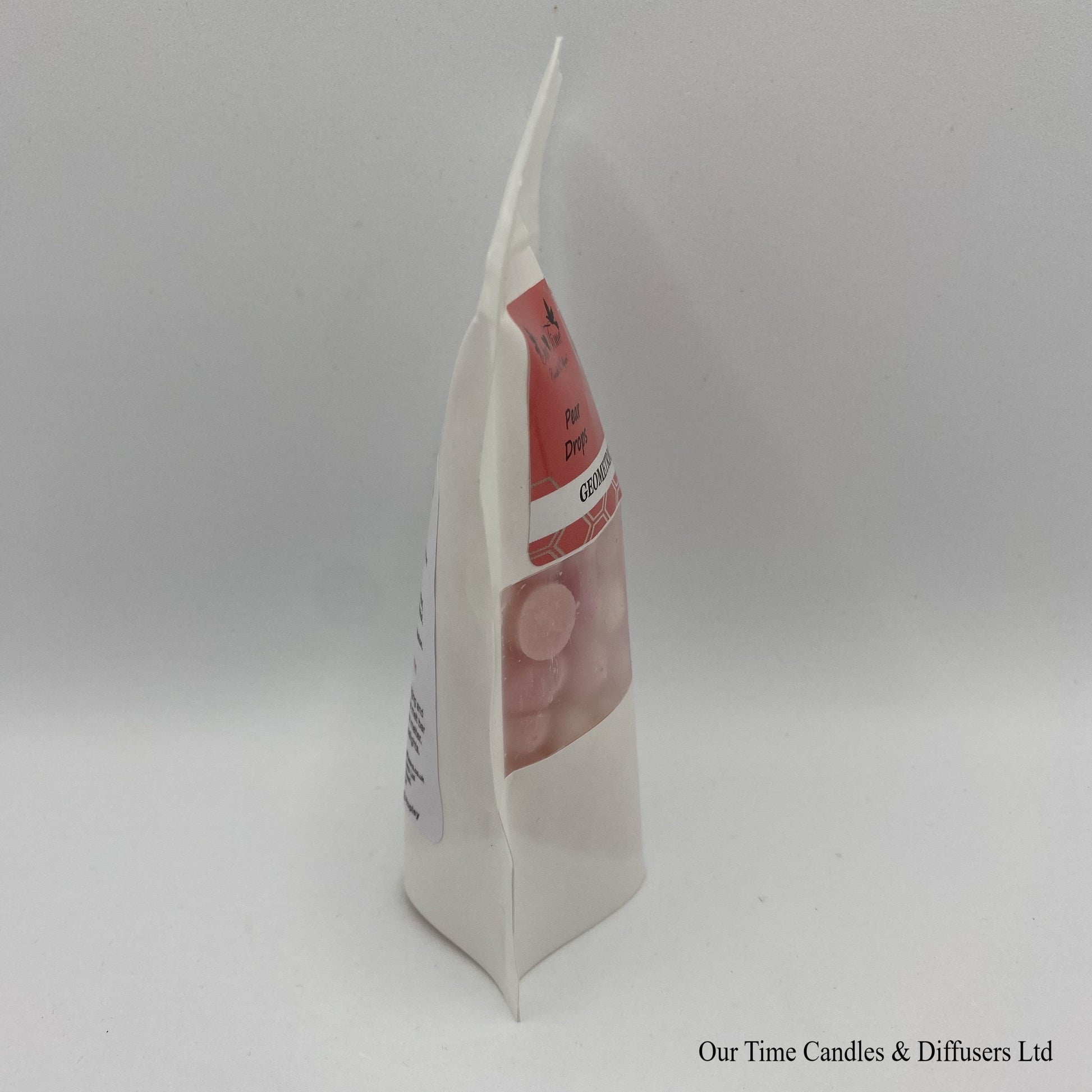 Sweet Pear Drop scented soy wax melt drops in a white bag