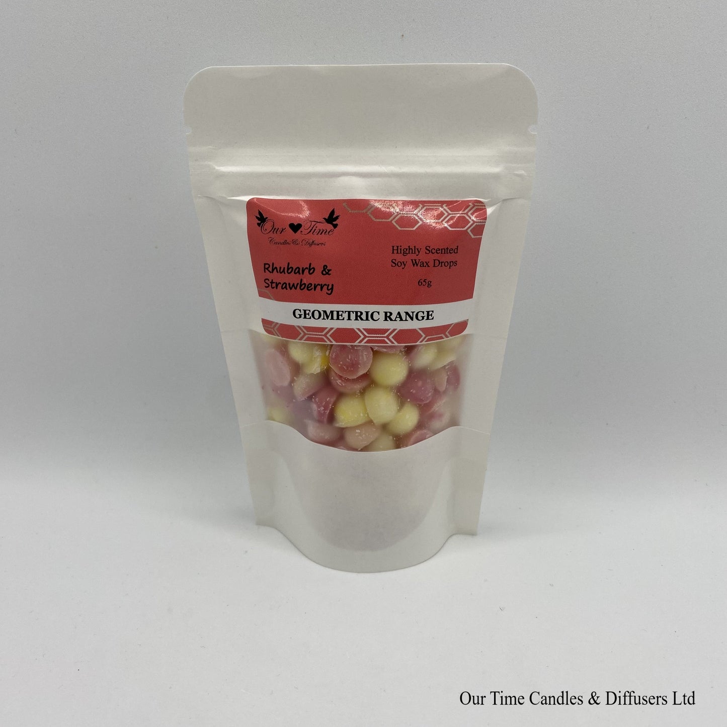 Rhubarb & Strawberry scented soy wax melt drops in a white bag