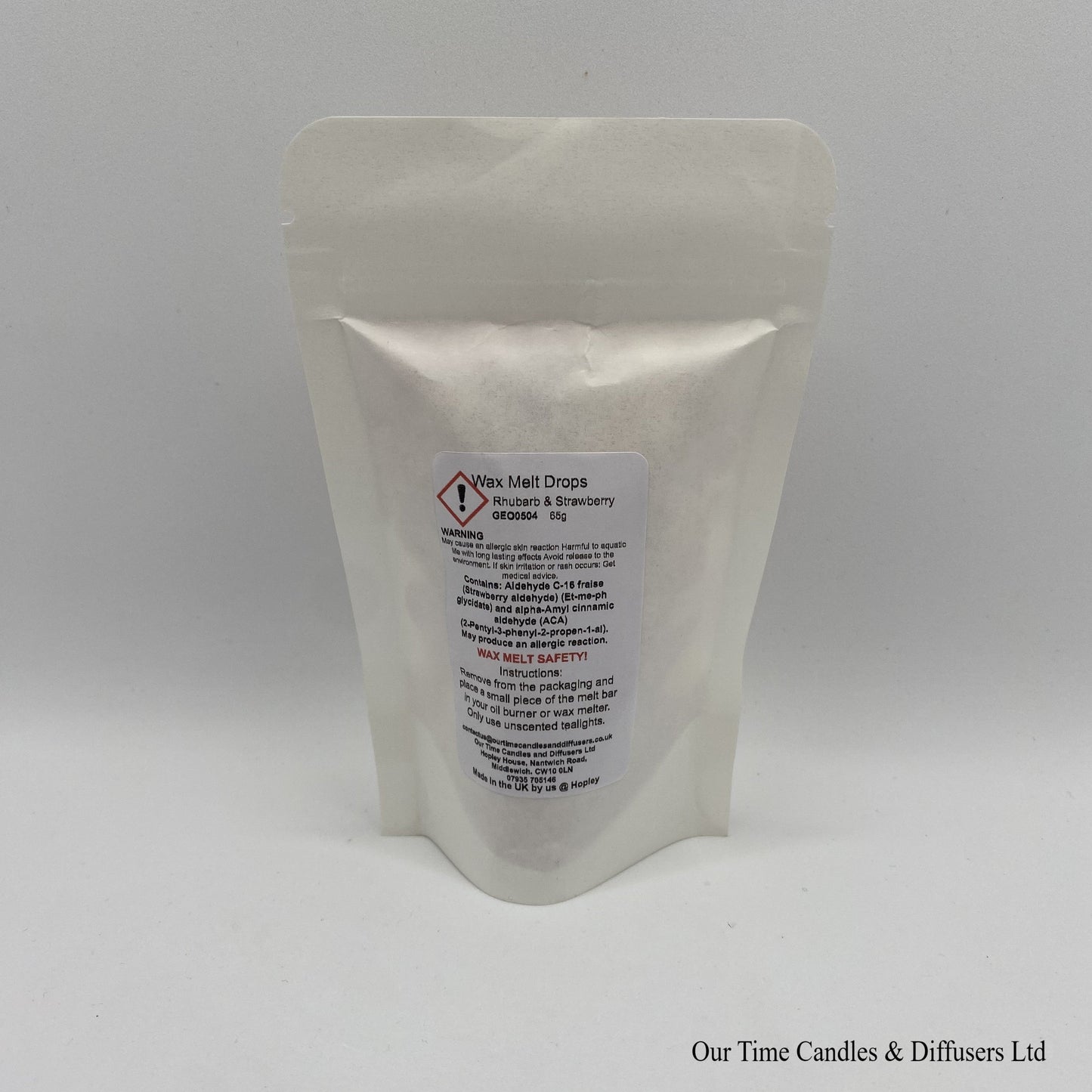 Rhubarb & Strawberry scented soy wax melt drops in a white bag