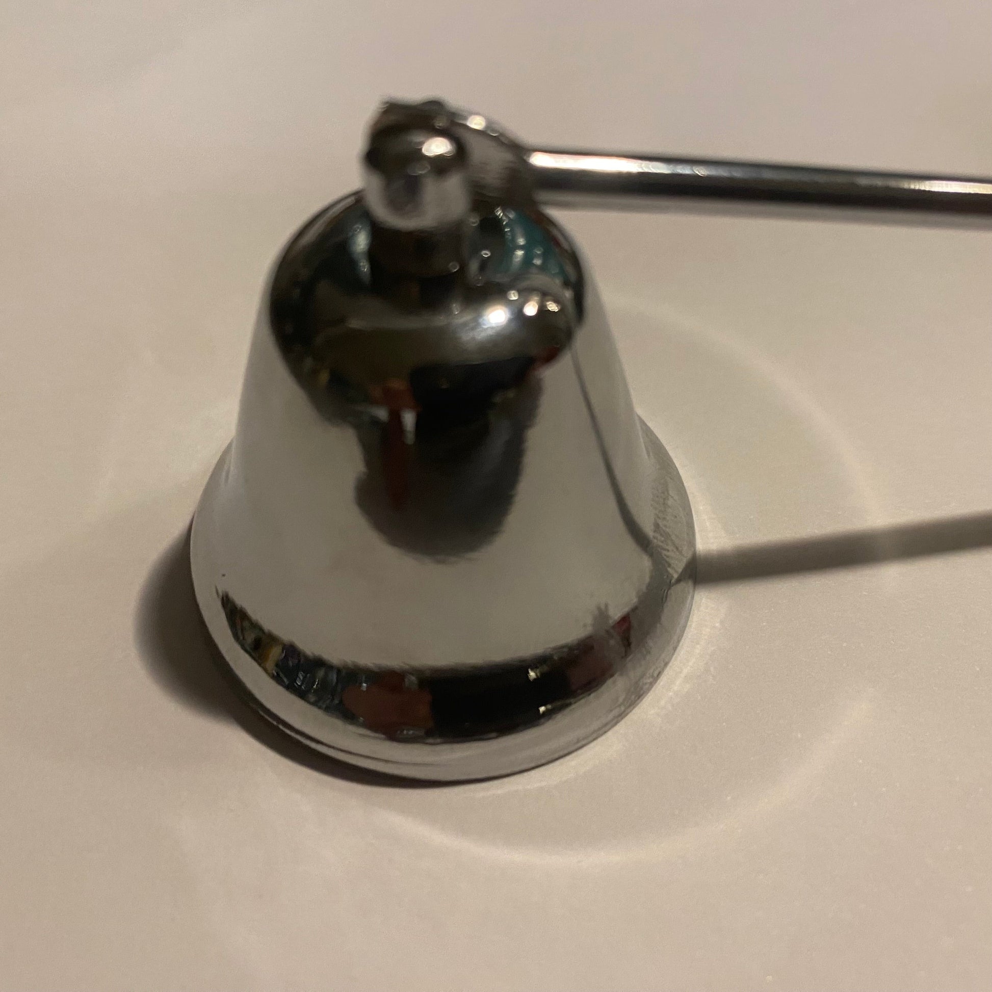 Silver candle snuffer