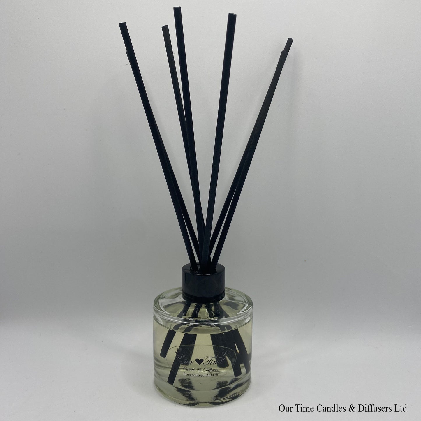 Our Time Diffuser in clear glass, black cap and black reeds