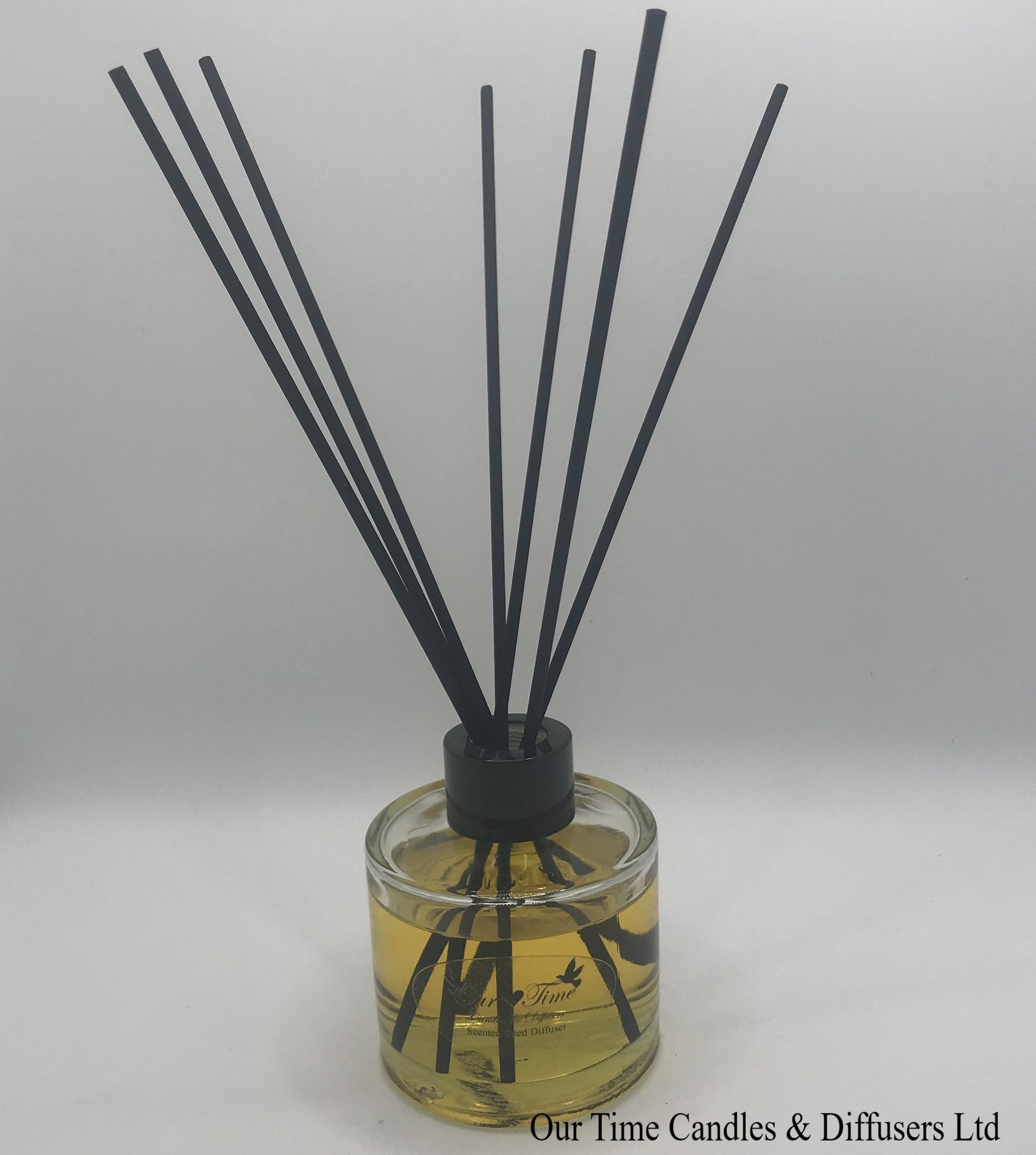 reed diffuser 100ml supplied in a clear bottle with black cap and black fibre reeds